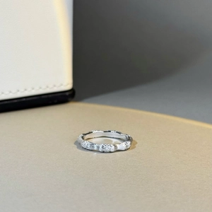 Macro detail of S925 sterling silver bamboo ring with textured finish and zircon accents