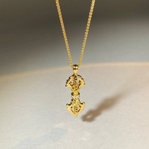 Gilded Vajra pendant necklace with sparkling zircons and fine twisted rope chain