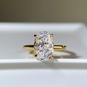 Luxurious 18K gold plated S925 silver ring featuring a large oval ice-cut solitaire stone