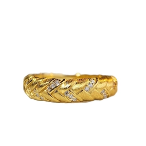 Braided 925 silver ring with 18K gold finish, matte texture and tiny inlaid zircons
