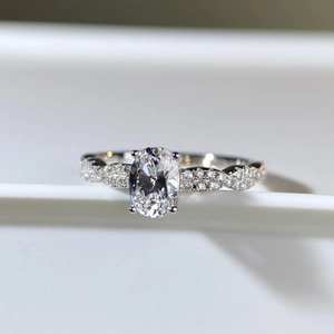 1ct oval-cut moissanite ring with twisted pavé band in 925 sterling silver