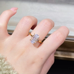 Close-up of 18K gold plated S925 silver ring with large oval ice-cut gemstone