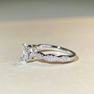 1 carat moissanite 925 silver ring with round cut stone and twisted infinity band design