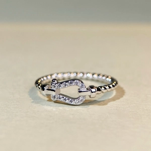 925 silver horseshoe ring with 18K gold plating and pavé cubic zirconia gemstones
