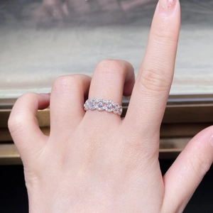 Close-up of S925 sterling silver lace ring with micro-set zircon in a wavy pattern