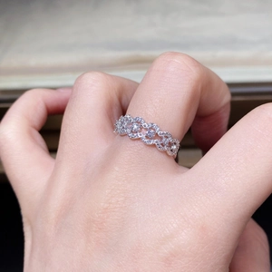 Close-up of S925 silver lace ring with woven pavé zircon and micro-beaded vintage details