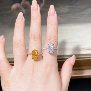 S925 sterling silver ring featuring 5-carat oval cut yellow and white cubic zirconia diamonds