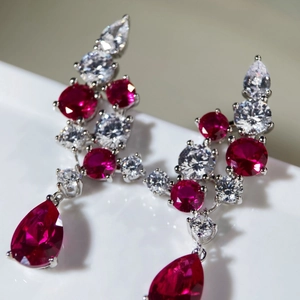 Elegant S925 silver drop earrings with red corundum and white pear-cut gemstones