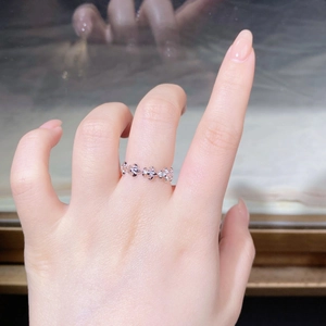Macro shot of S925 sterling silver ring with vintage floral hollow engraving pattern