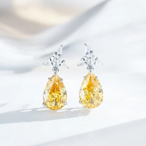 Orecchini di lusso in argento 925 con pietre di zirconia gialla a forma di pera