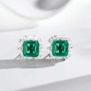 Sparkling S925 sterling silver halo earrings with emerald-cut green zirconia stones