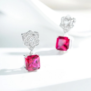 S925 silver camellia earrings featuring red corundum drops and micro-paved zircons