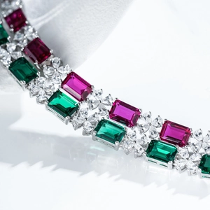 Bracelet luxueux en argent 925 avec deux rangées de pierres rouges et vertes