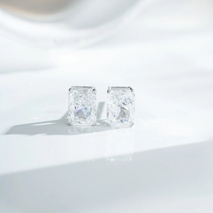 Classic S925 sterling silver stud earrings featuring radiant cut sparkling yellow gemstones