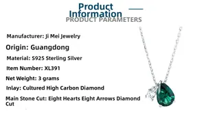 Macro shot of S925 silver necklace with pear-cut emerald pendant and 8 hearts and arrows stones