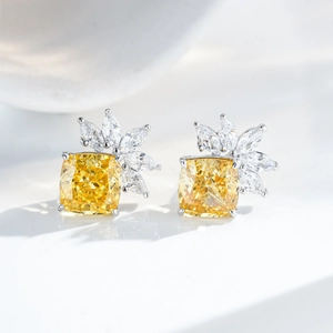 Elegant S925 silver stud earrings with yellow cushion-cut stones and marquise petal accents
