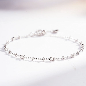 Elegant S925 sterling silver beaded bracelet with polished spheres and star charms