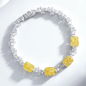 Detailed view of luxury S925 silver bracelet with yellow cushion-cut stones and marquise diamonds