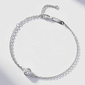 Macro detail of S925 sterling silver bubble bracelet with round brilliant bezel-set zircon