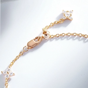 Adjustable S925 sterling silver gold bracelet with star charm and sparkling zircons