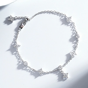 Adjustable S925 silver bracelet featuring sparkling cubic zirconia stars and round charms
