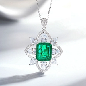 Elegant emerald cut green stone necklace surrounded by pear shaped zircons in S925 silver