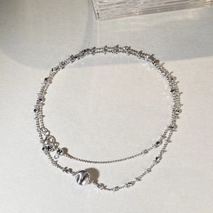925 silver double-layer bead chain necklace with cat eye bead pendant in 45-degree view