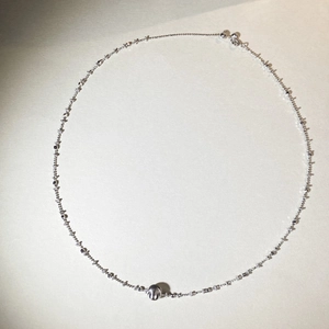 925 sterling silver beaded necklace with cat-eye ball pendant on white background