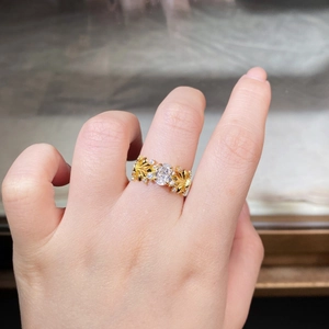 Close-up of S925 silver iris ring with 1ct ice-cut stone and vintage floral patterns