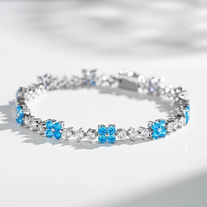 Bracciale quadrifoglio in argento S925 con zirconi blu e trasparenti incastonati