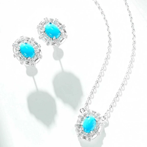 Macro detail of 925 silver turquoise necklace and stud earrings with crystal halo