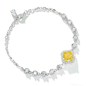 S925 sterling silver bracelet featuring a cushion-cut yellow gemstone with white zircons