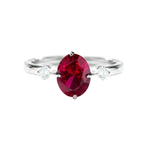 Classic 925 silver ring featuring an oval red ruby and sparkling side zircons