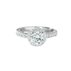 Classic 1 carat round moissanite halo ring in polished silver setting with pave diamonds