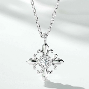 Classic silver fleur-de-lis cross necklace with a brilliant round-cut center gemstone