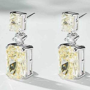 Three-stone S925 silver earrings featuring radiant yellow carbon diamonds in ice-flower cut