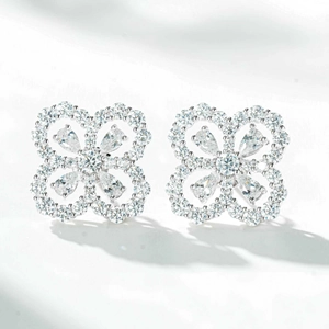 Detailed close-up of S925 silver clover earrings featuring pear-cut cubic zirconia stones