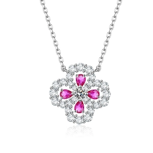 Sparkling silver four leaf clover necklace with pink gemstone petals and micro diamond inlay