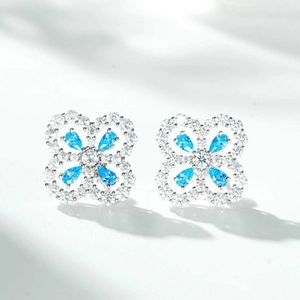 Elegant silver four-leaf clover stud earrings with sky blue pear-cut gemstones and zircons