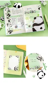 Close-up of cute panda theme stationery with green stickers and notebook for journaling