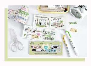 Detail of panda washi tape with functional weekly planner layout and cute illustrations