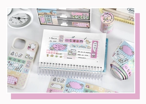 Cute cat-themed washi tape and stickers set used on notebook and phone case covers