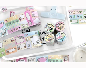 Close-up of decorative washi tape rolls for journaling in pastel macaron colors