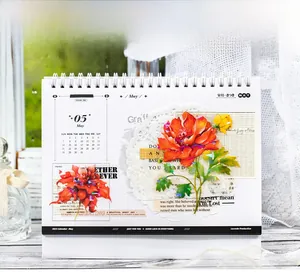 Detailed view of floral PET stickers with metallic finish on a 2023 calendar page