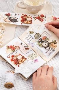 Close-up of vintage manor diary washi tape featuring antique roses and old clocks