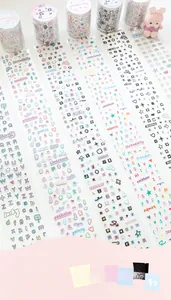 Macro shot of macaron colored alphabet and word stickers with cute bunny decor