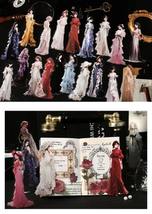 Detailed view of vintage PET stickers featuring elegant gowns for DIY scrapbooking decor