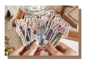 Detailed fan-style display of Japanese character stickers for journaling decoration