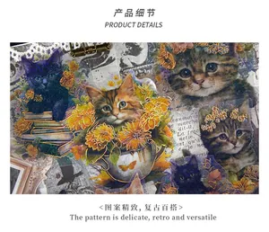Detailed close-up of retro cat stickers with holographic finish and floral elements