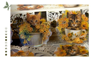 Detailed view of cat-themed stickers with gold foil accents on vintage newspaper